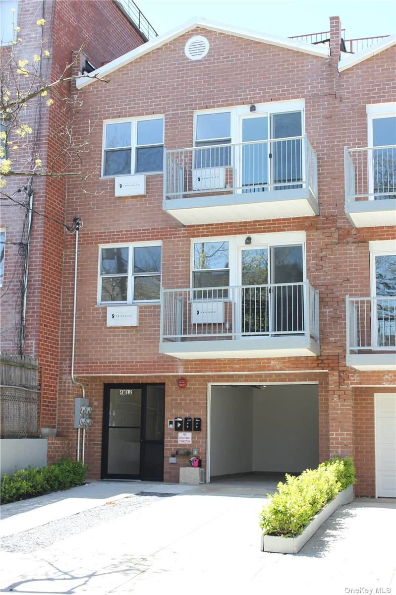48-12 58th Lane - Photo 1