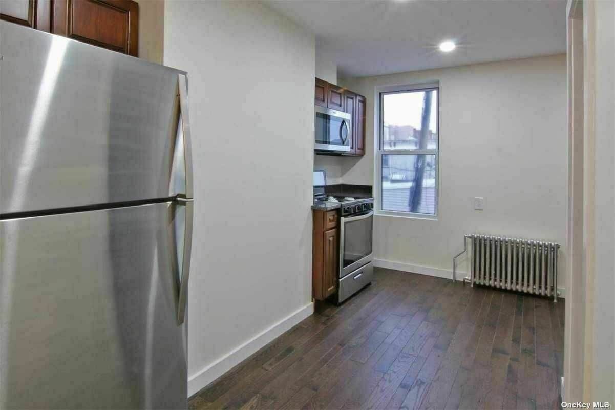 56-10 61st Street - Photo 1