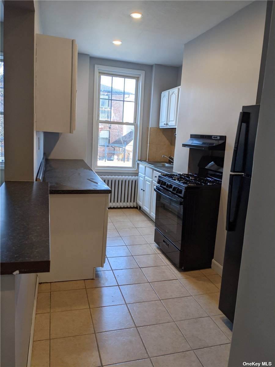87-06 77th Street - Photo 1