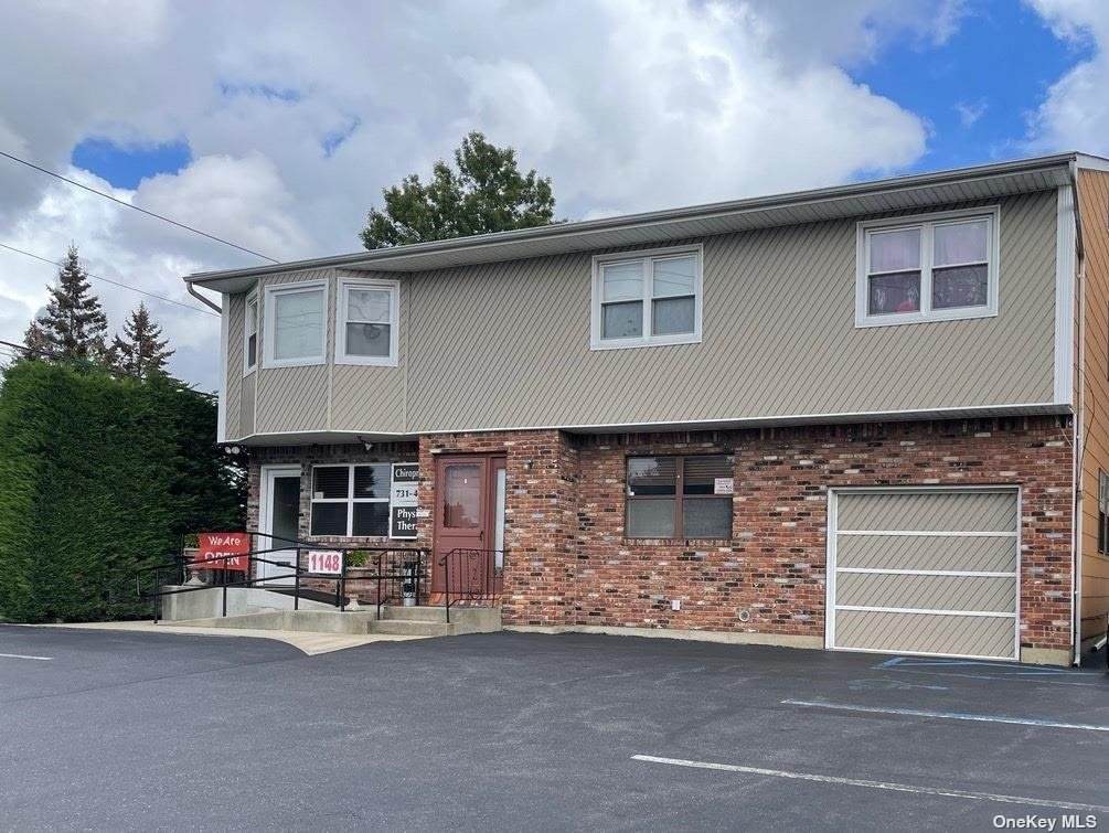 1148 Hicksville Road - Photo 1