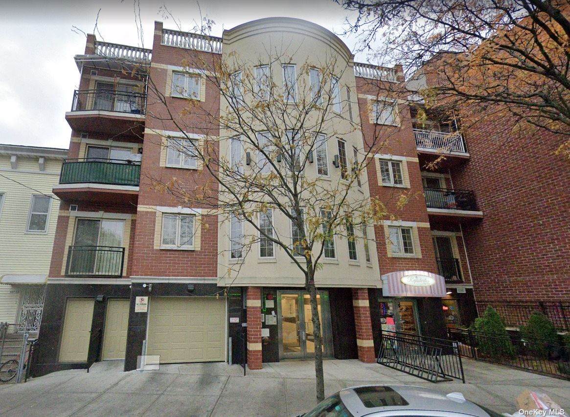 107-16 37th Avenue - Photo 1