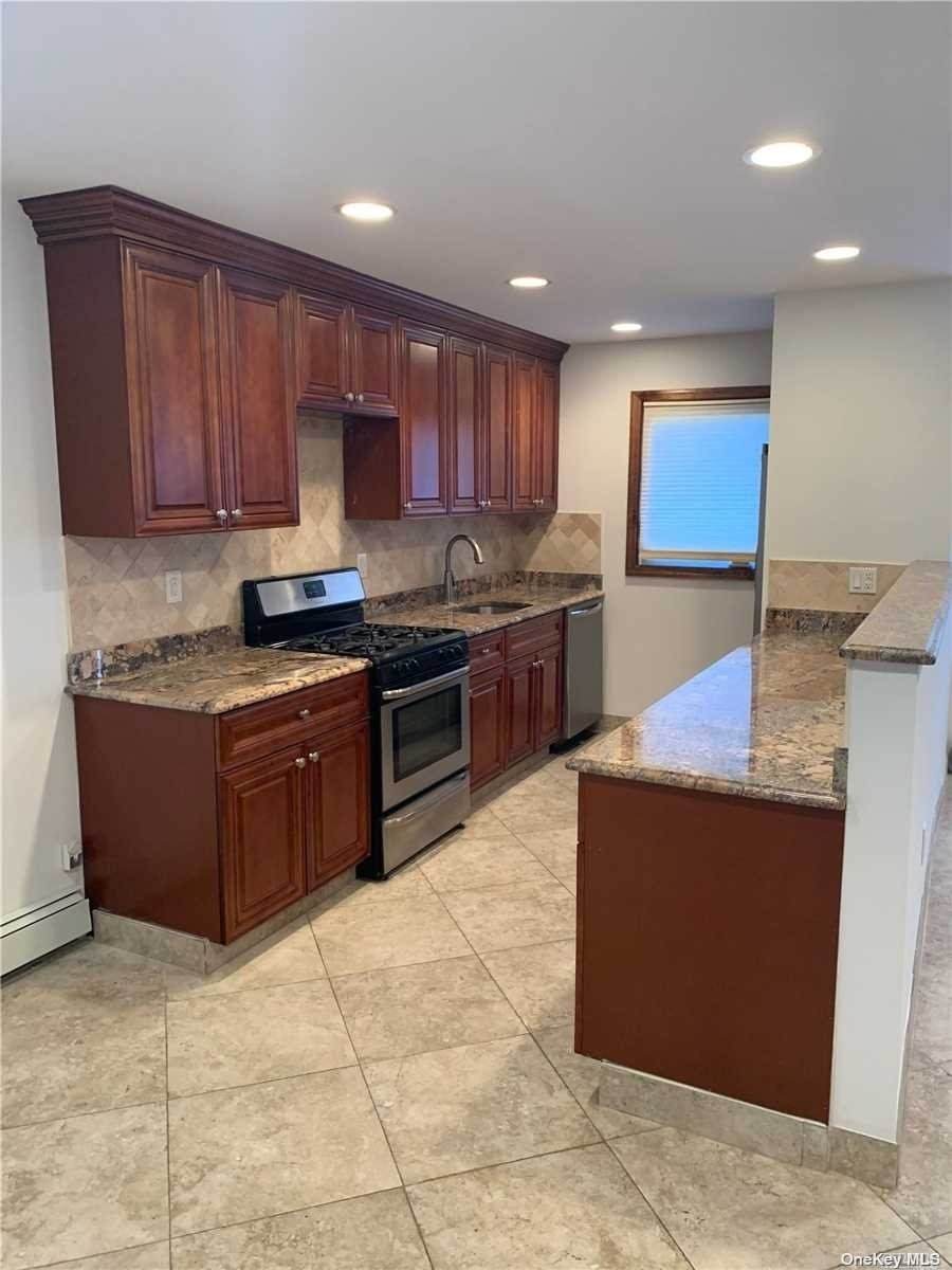 63-44 75th Street - Photo 1