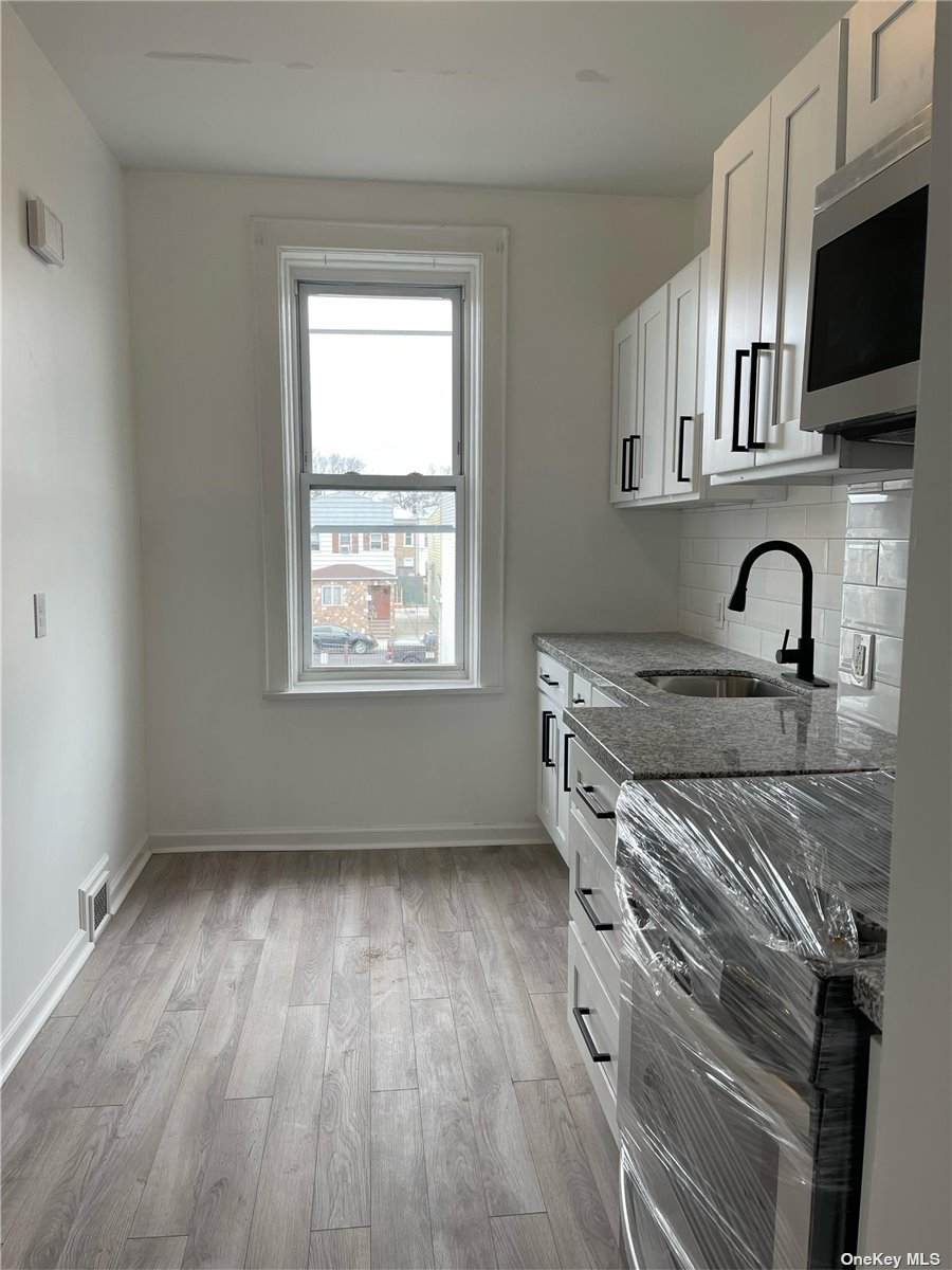 71-40 68th Street - Photo 1