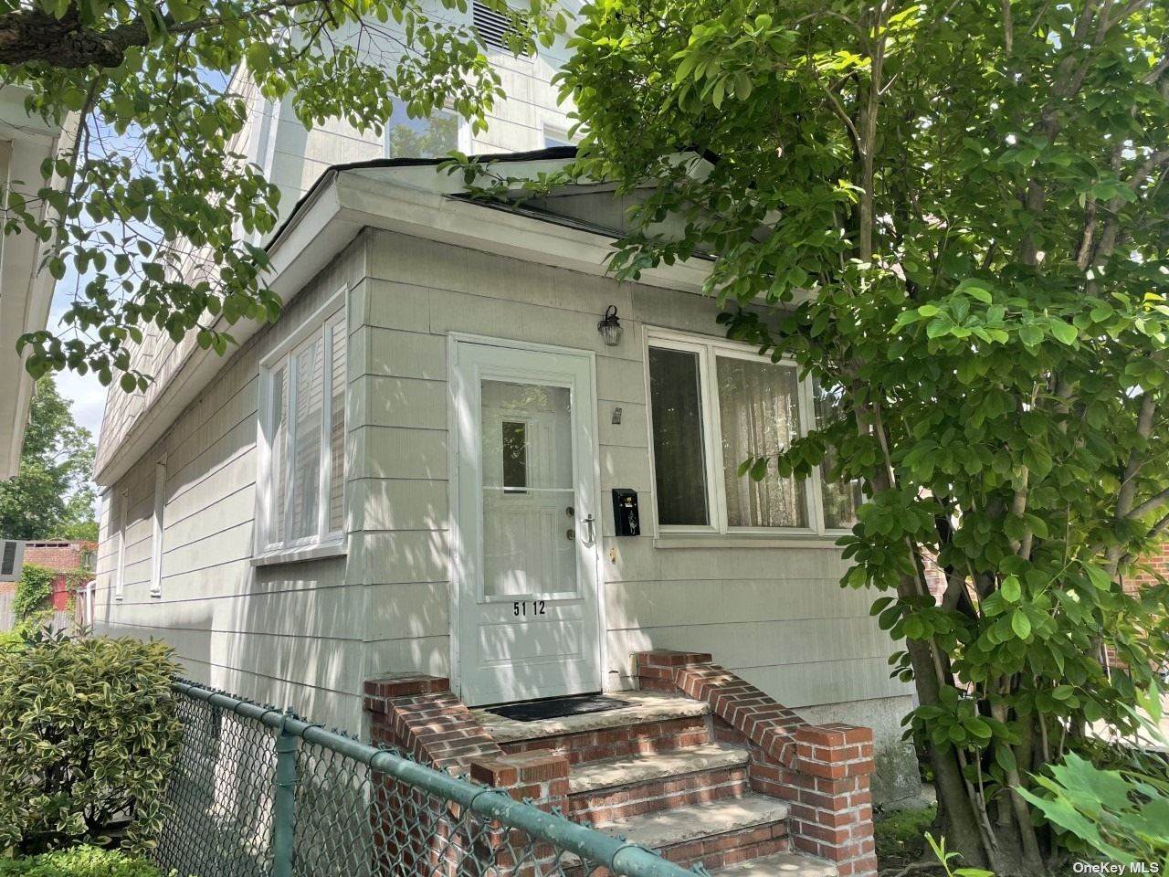 51-12 67th Street - Photo 1