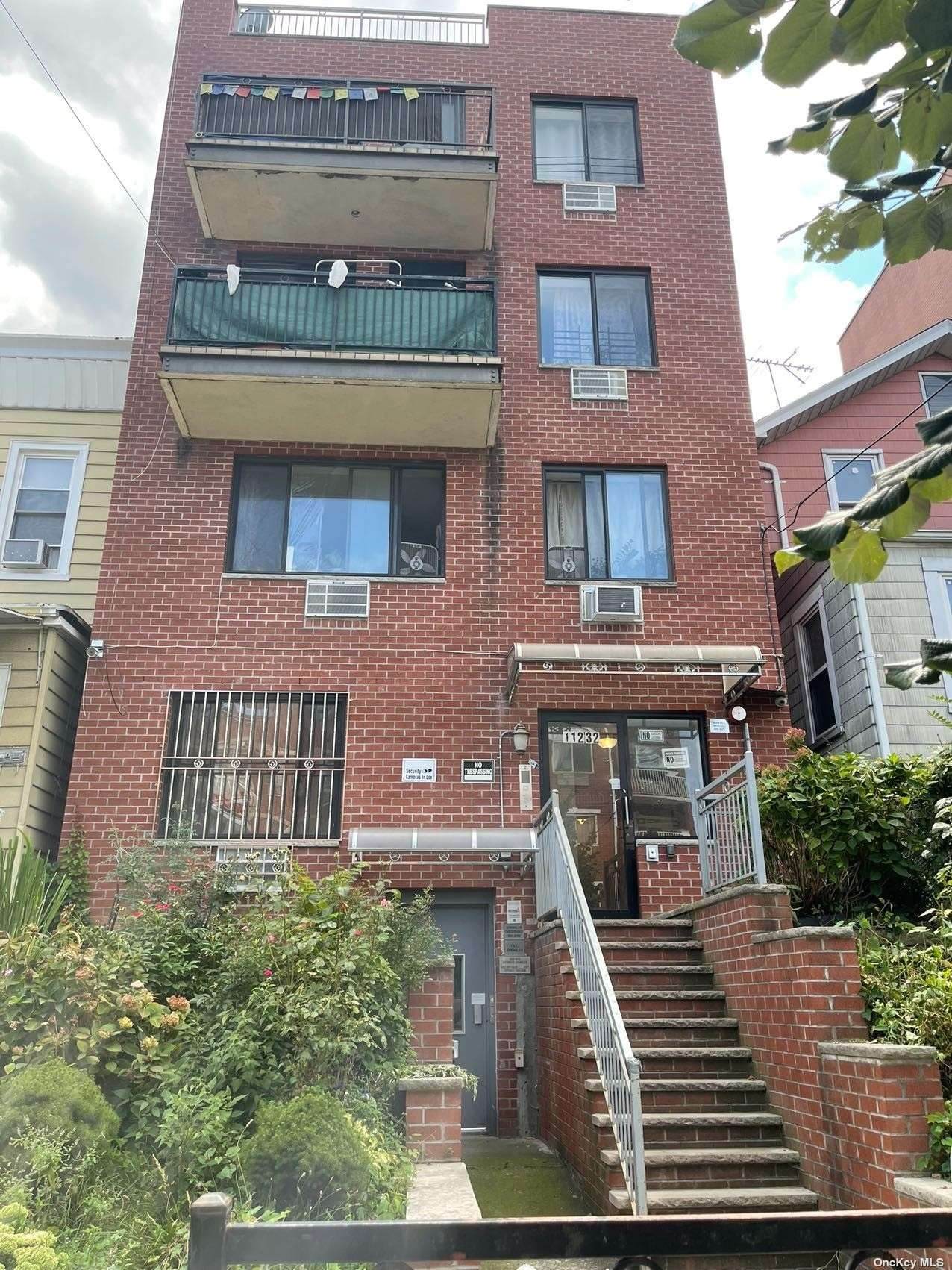 112-32 38th Avenue - Photo 1