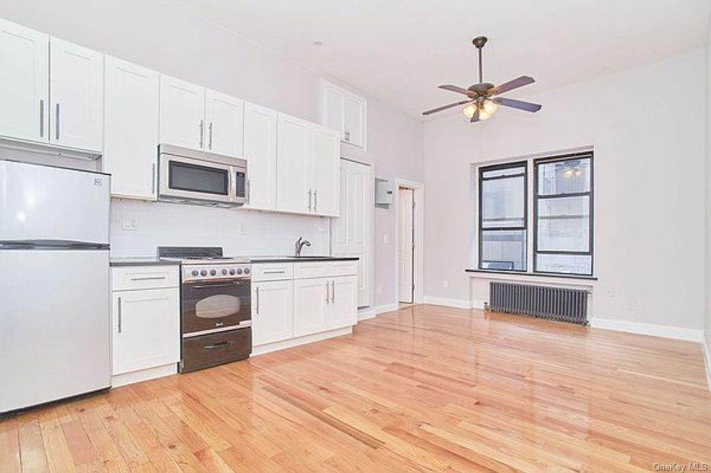 211 W 53rd St - Photo 1