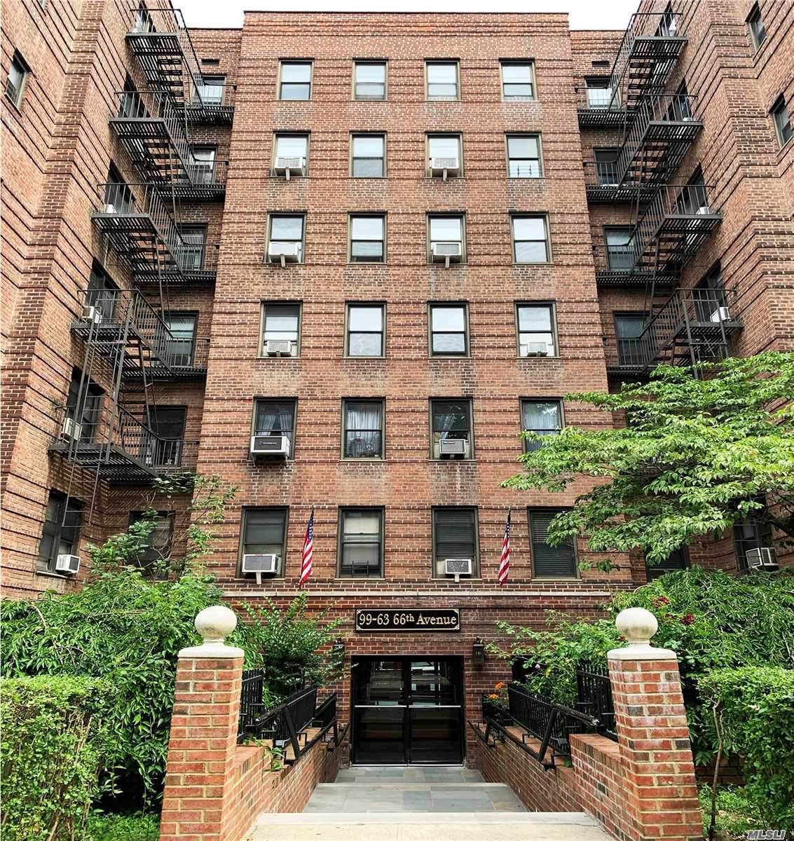 99-63 66th Ave - Photo 1
