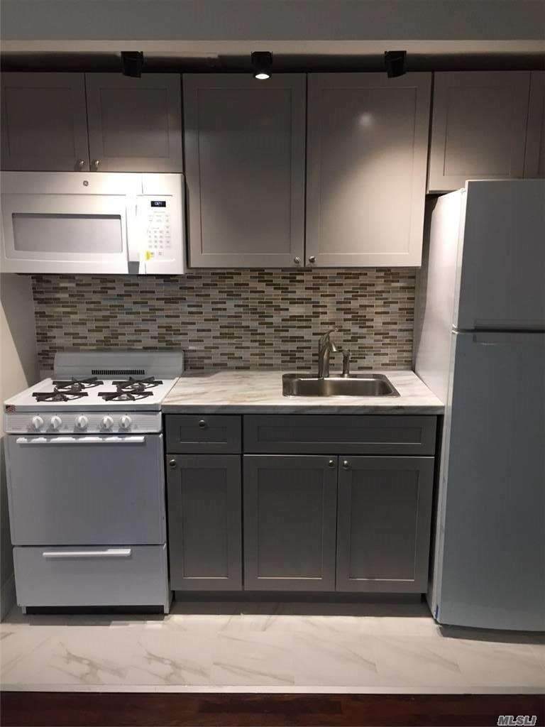 211-10 73rd Avenue - Photo 1