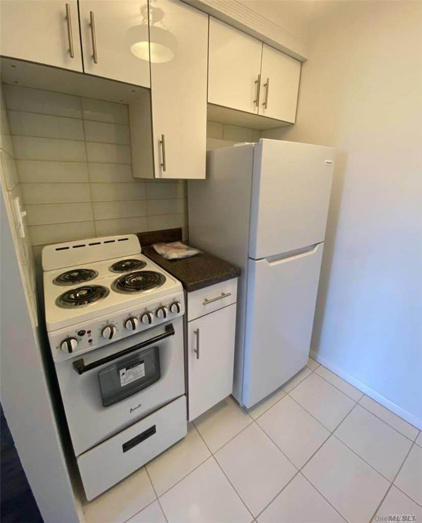 60-16 86th Street - Photo 1
