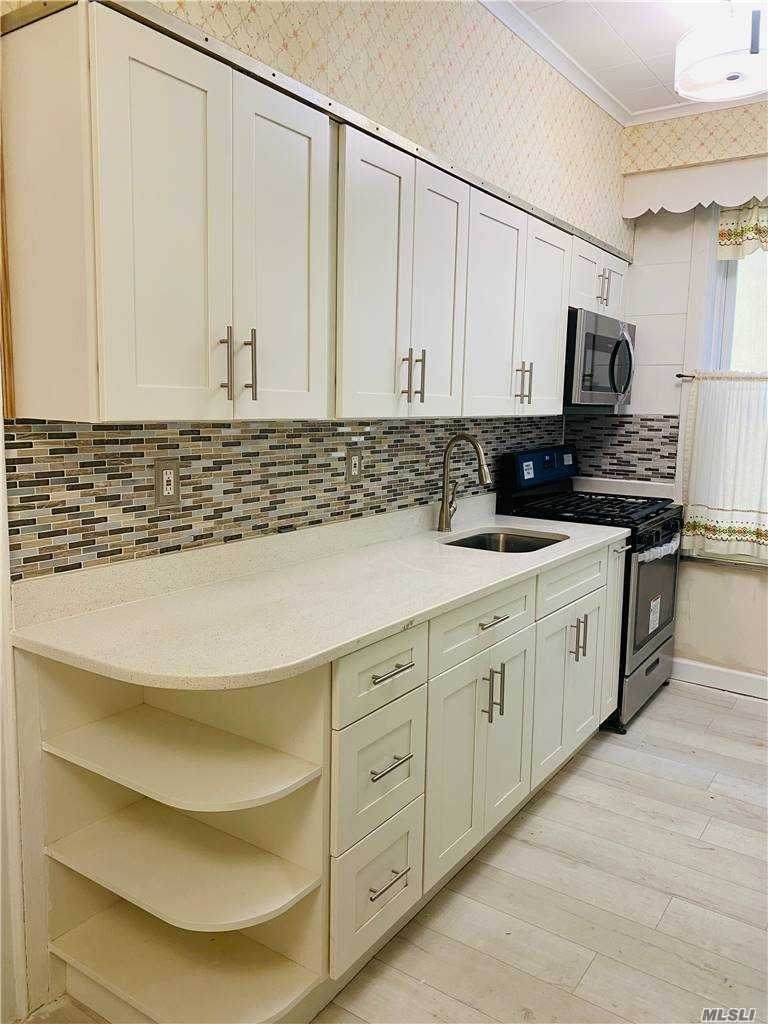 59-24 56th Drive - Photo 1