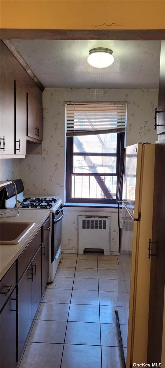 90-11 Northern Boulevard - Photo 1