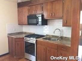 77-11 79th Street - Photo 1