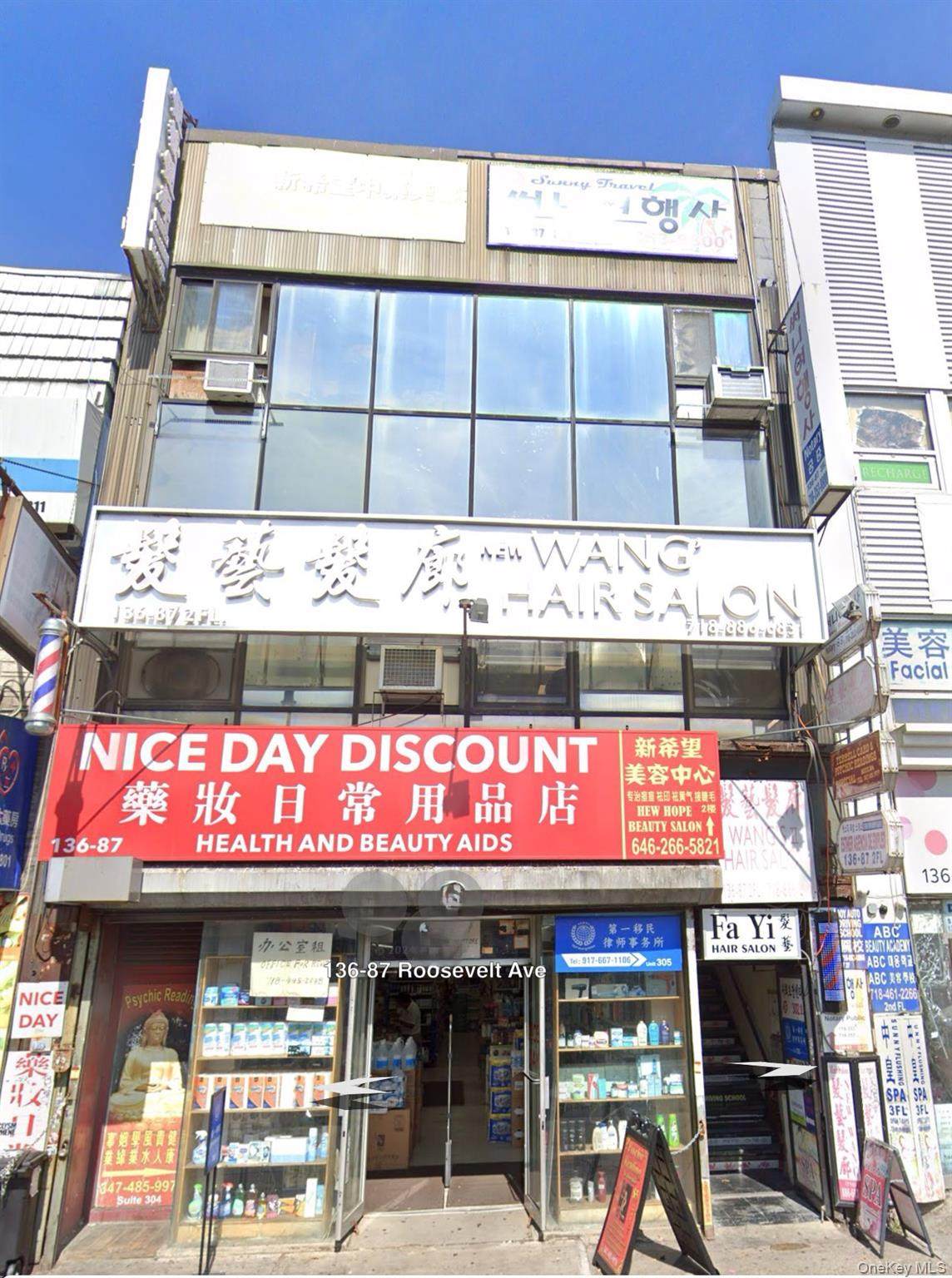 136-87 Roosevelt Avenue - Photo 1