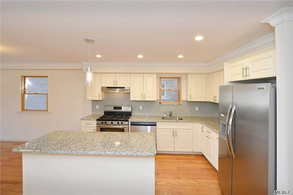 64-10 Perry Avenue - Photo 1
