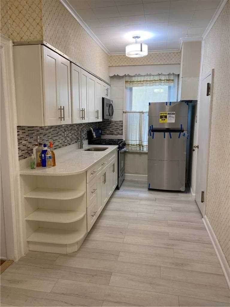 59-24 56th Drive - Photo 1