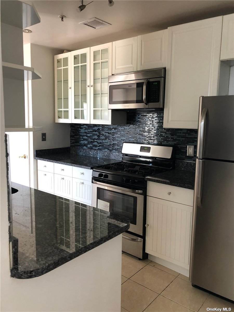 38-11 108th Street - Photo 1