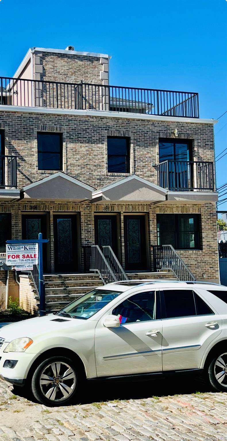 38-22 56th Street - Photo 1